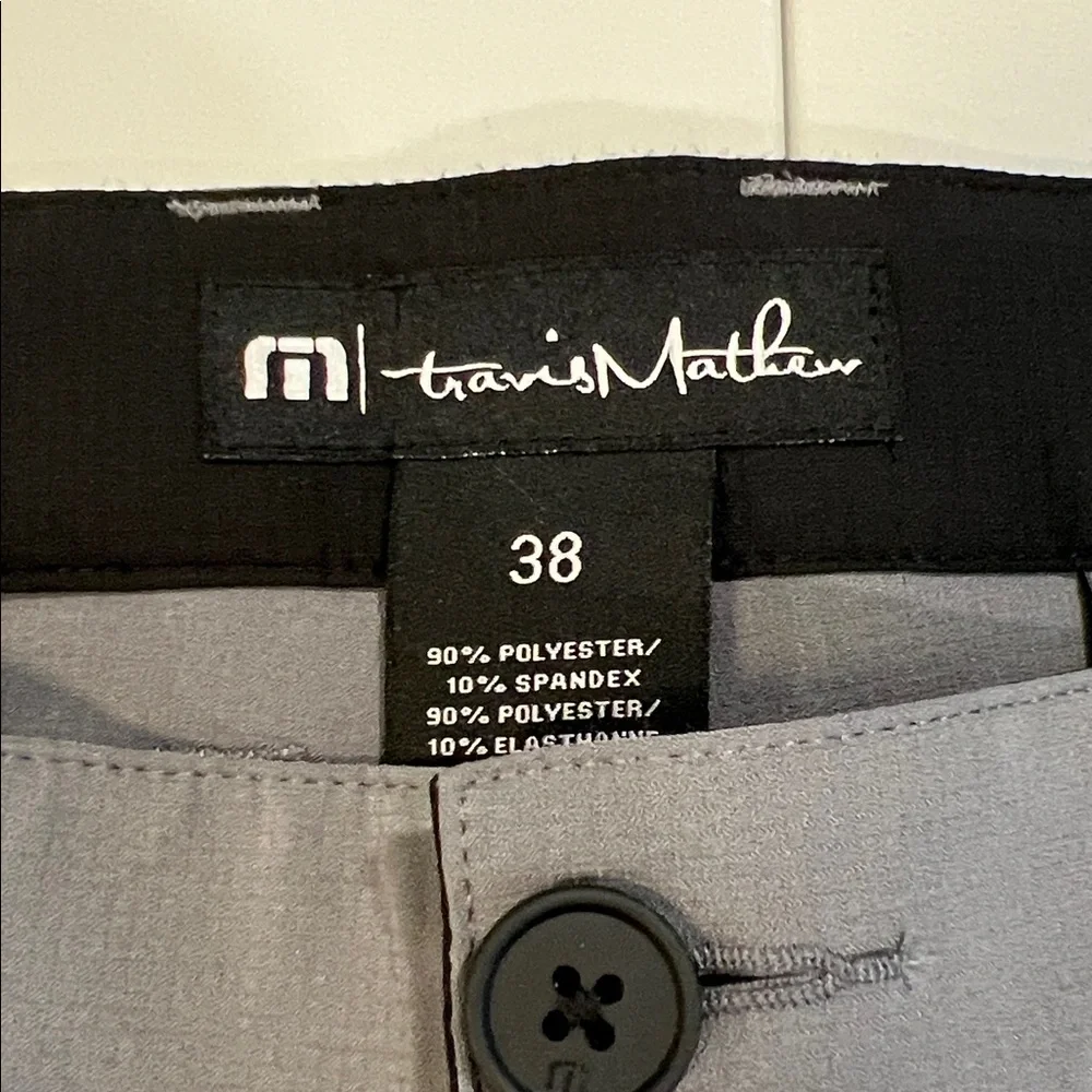 Travis Mathew - 38, light weight gray flat front‎ shorts